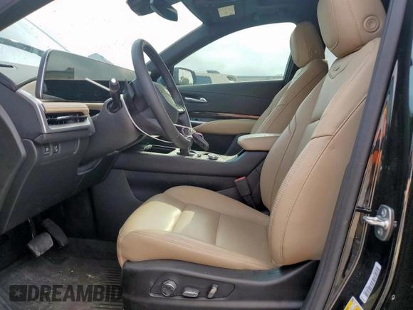 2024 Cadillac XT4 FWD Premium Luxury with VIN 1GYFZCR49RF248341, listed as a Copart auction lot 58586035 with 12,490 mi miles and Salvage title. Bid and sale history available at DreamBid. Image 7.