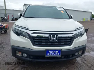 2019 Honda Ridgeline RTL-T z VIN 5FPYK2F69KB004726, wystawiony jako IAAI lot #42189854 z przebiegiem 71 665 mil mil oraz . Historia ofert i sprzedaży dostępna na DreamBid. Obrazek 13.