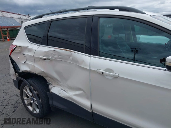 2013 Ford Escape SEL с VIN 1FMCU9H99DUC62280, выставлен на аукционе IAAI как лот 42430435 с пробегом 112 411 миль миль и . История ставок и продаж доступна на DreamBid. Изображение 17.
