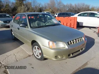 2000 Hyundai Accent z VIN KMHCG45G3YU034438, wystawiony jako IAAI lot #41356583 z przebiegiem 57 283 mil mil oraz . Historia ofert i sprzedaży dostępna na DreamBid. Obrazek 1.