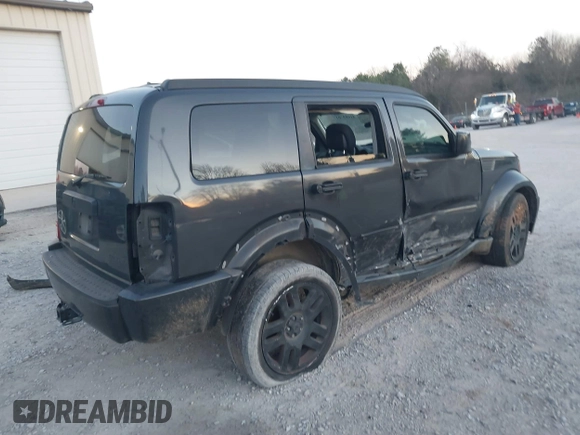 2010 Dodge Nitro SE with VIN 1D4PT2GK3AW137797, listed as a IAAI auction lot 41689701 with 182,452 mi miles. Bid and sale history available at carsss.com. Image 4.