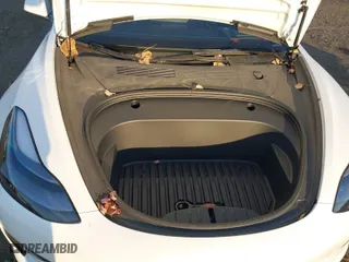 2023 Tesla Model 3 Long Range with VIN 5YJ3E1EB8PF604938, listed as a IAAI auction lot 40893475 with 21,414 mi miles. Bid and sale history available at carsss.com. Image 10.