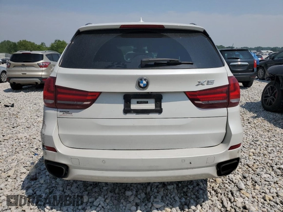 2014 BMW X5 xDrive50i z VIN 5UXKR6C54E0J71803, wystawiony jako Copart lot #60000295 z przebiegiem 130 769 mil mil oraz Czysty tytuł • Clean title. Historia ofert i sprzedaży dostępna na DreamBid. Obrazek 6.
