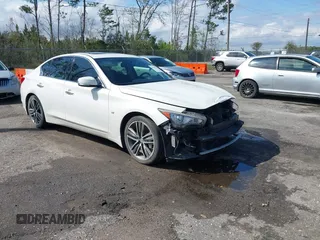 2015 Infiniti Q50 Premium with VIN JN1BV7APXFM331963, listed as a IAAI auction lot 41743215 with 142,489 mi miles. Bid and sale history available at carsss.com. Image 1.