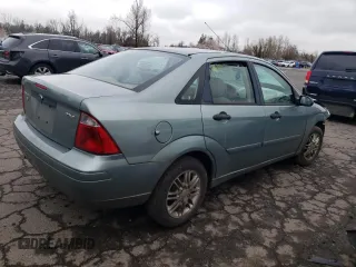 2005 Ford Focus S with VIN 1FAFP34N75W290051, listed as a Copart auction lot 48337245 with 0 mi miles and Salvage Title. Bid and sale history available at carsss.com. Image 3.