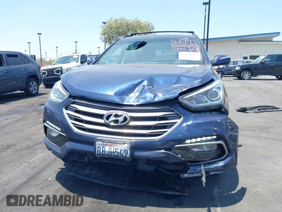 2018 Hyundai Santa Fe 2.0T z VIN 5XYZU4LA8JG537427, wystawiony jako IAAI lot #42349692 z przebiegiem 148 764 mil mil oraz . Historia ofert i sprzedaży dostępna na DreamBid. Obrazek 12.