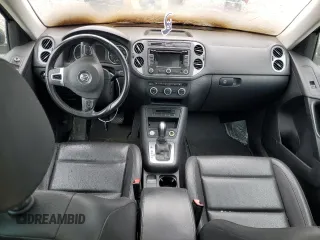 2015 Volkswagen Tiguan SE z VIN WVGBV7AXXFW606017, wystawiony jako Copart lot #51005745 z przebiegiem Nie podano mil oraz Szkoda całkowita • Salvage title. Historia ofert i sprzedaży dostępna na DreamBid. Obrazek 8.