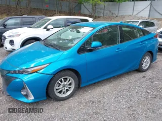 2017 Toyota Prius Plus z VIN JTDKARFP5H3006370, wystawiony jako IAAI lot #42247423 z przebiegiem 116 412 mil mil oraz . Historia ofert i sprzedaży dostępna na DreamBid. Obrazek 20.