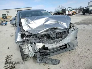 2015 Mazda CX-5 Touring with VIN JM3KE4CY4F0467571, listed as a Copart auction lot 88919035 with 197,755 mi miles and Salvage Title. Bid and sale history available at carsss.com. Image 11.