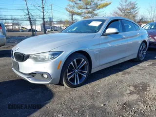 2020 BMW 4 Series 430i xDrive z VIN WBA4J3C03LCD21710, wystawiony jako IAAI lot #41768173 z przebiegiem 53 004 mil mil oraz . Historia ofert i sprzedaży dostępna na DreamBid. Obrazek 16.