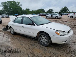 2007 Ford Taurus SE z VIN 1FAFP53U87A138588, wystawiony jako Copart lot #56965245 z przebiegiem Nie podano mil oraz Szkoda całkowita • Salvage title. Historia ofert i sprzedaży dostępna na DreamBid. Obrazek 4.