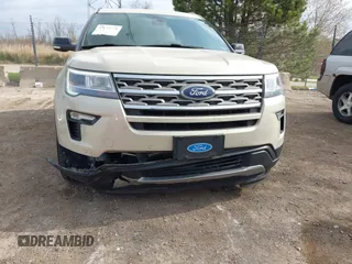2018 Ford Explorer XLT z VIN 1FM5K8D8XJGB48238, wystawiony jako IAAI lot #42134728 z przebiegiem 88 434 mil mil oraz . Historia ofert i sprzedaży dostępna na DreamBid. Obrazek 6.