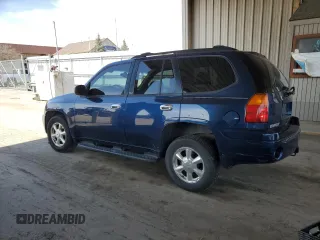 2004 GMC Envoy SLE with VIN 1GKDT13S142201271, listed as a Copart auction lot 50249705 with 248,364 mi miles and Salvage Title. Bid and sale history available at carsss.com. Image 2.