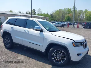 2021 Jeep Grand Cherokee Limited z VIN 1C4RJFBG3MC654089, wystawiony jako IAAI lot #42015985 z przebiegiem 63 901 mil mil oraz . Historia ofert i sprzedaży dostępna na DreamBid. Obrazek 1.