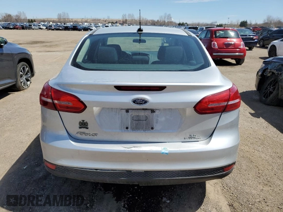 2016 Ford Focus SE with VIN 1FADP3F21GL299925, listed as a Copart auction lot 51010035 with 179,622 mi miles and Salvage Title. Bid and sale history available at carsss.com. Image 6.