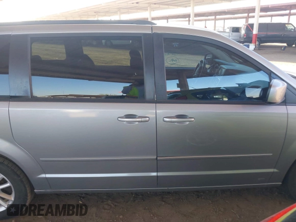 2016 Dodge Grand Caravan SXT with VIN 2C4RDGCG9GR323668, listed as a IAAI auction lot 42025601 with 125,351 mi miles and . Bid and sale history available at DreamBid. Image 13.