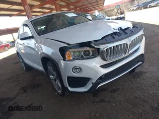 2016 BMW X4 xDrive28i z VIN 5UXXW3C5XG0R21527, wystawiony jako IAAI lot #42131919 z przebiegiem 58 420 mil mil oraz . Historia ofert i sprzedaży dostępna na DreamBid. Obrazek 1.