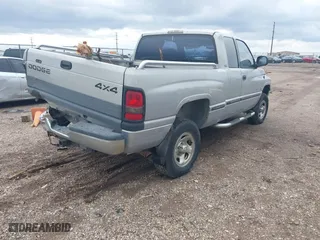 1999 Dodge Ram 1500 with VIN 3B7HF13Z8XG140644, listed as a IAAI auction lot 41971280 with 157,584 mi miles. Bid and sale history available at carsss.com. Image 4.