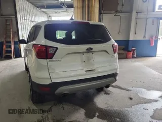 2019 Ford Escape SE with VIN 1FMCU9GD4KUA65505, listed as a IAAI auction lot 42013965 with 120,353 mi miles. Bid and sale history available at carsss.com. Image 1.