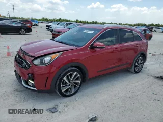 2018 Kia Niro Touring with VIN KNDCE3LC1J5111263, listed as a Copart auction lot 51804444 with 104,192 mi miles and Non Repairable. Bid and sale history available at carsss.com. Image 1.
