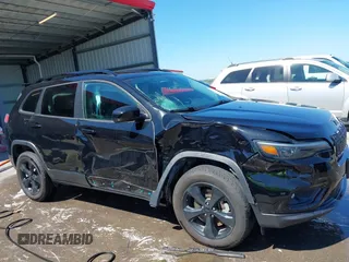 2019 Jeep Cherokee Latitude Plus with VIN 1C4PJMLB1KD465933, listed as a IAAI auction lot 42624557 with 68,045 mi miles and . Bid and sale history available at DreamBid. Image 6.