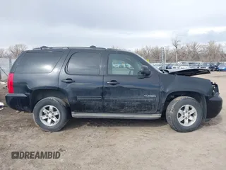 2011 GMC Yukon SLT with VIN 1GKS2CE02BR365229, listed as a IAAI auction lot 41601082 with 203,739 mi miles. Bid and sale history available at carsss.com. Image 13.