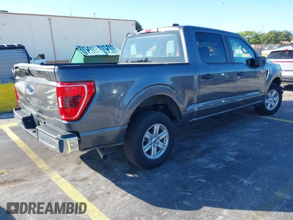 2023 Ford F-150 XL with VIN 1FTEW1C55PKD33889, listed as a IAAI auction lot 41345457 with 40,996 mi miles and . Bid and sale history available at DreamBid. Image 4.