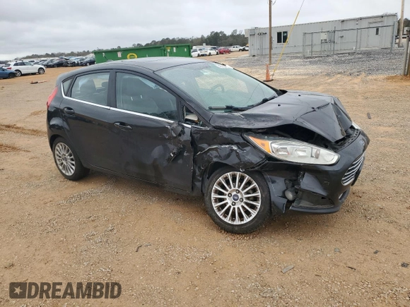 2014 Ford Fiesta Titanium z VIN 3FADP4FJ9EM110690, wystawiony jako Copart lot #48338625 z przebiegiem 175 441 mil mil oraz Szkoda całkowita • Salvage title. Historia ofert i sprzedaży dostępna na DreamBid. Obrazek 4.