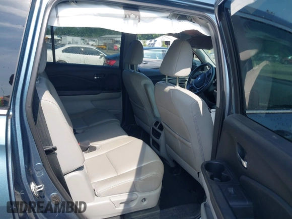 2018 Honda Pilot EX-L with VIN 5FNYF6H52JB050535, listed as a IAAI auction lot 42576721 with 99,280 mi miles and . Bid and sale history available at DreamBid. Image 8.