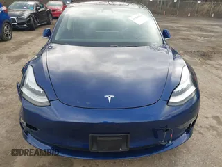 2019 Tesla Model 3 Mid Range with VIN 5YJ3E1EA5KF299589, listed as a IAAI auction lot 41709733 with 50,256 mi miles and . Bid and sale history available at DreamBid. Image 13.