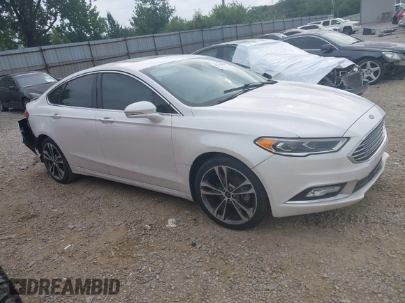 2017 Ford Fusion Titanium with VIN 3FA6P0D96HR239830, listed as a IAAI auction lot 42741998 with 116,951 mi miles and . Bid and sale history available at DreamBid. Image 1.