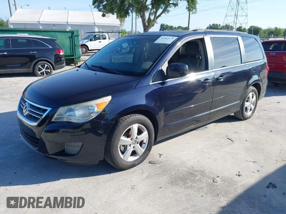 2011 Volkswagen Routan SE with VIN 2V4RW3DG5BR668194, listed as a IAAI auction lot 42483379 with 203,945 mi miles and . Bid and sale history available at DreamBid. Image 17.
