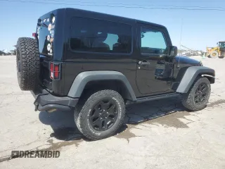 2013 Jeep Wrangler Sahara with VIN 1C4AJWBG8DL602065, listed as a Copart auction lot 52082535 with 110,727 mi miles and Salvage title. Bid and sale history available at DreamBid. Image 3.