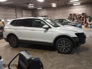 2021 Volkswagen Tiguan SE with VIN 3VV2B7AX1MM142501, listed as a IAAI auction lot 40983853 with 45,121 mi miles. Bid and sale history available at carsss.com. Image 14.