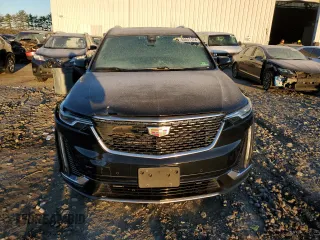2023 Cadillac XT6 FWD Premium Luxury z VIN 1GYKPCRS7PZ105628, wystawiony jako Copart lot #84841124 z przebiegiem Nie podano mil oraz Szkoda całkowita • Salvage title. Historia ofert i sprzedaży dostępna na DreamBid. Obrazek 5.