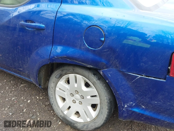 2013 Dodge Avenger SE with VIN 1C3CDZAB4DN628596, listed as a IAAI auction lot 41904599 with 56,791 mi miles and . Bid and sale history available at DreamBid. Image 6.