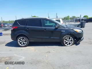 2015 Ford Escape Titanium с VIN 1FMCU0JX5FUB87813, выставлен на аукционе IAAI как лот 42035295 с пробегом 148 430 миль миль и . История ставок и продаж доступна на DreamBid. Изображение 13.