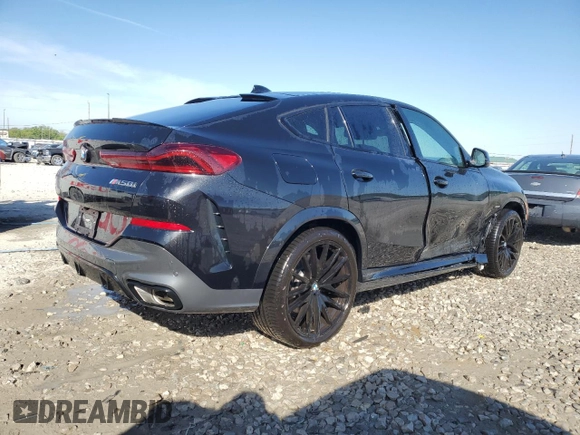 2023 BMW X6 M50i with VIN 5UXCY8C05P9N77000, listed as a Copart auction lot 50704703 with 5,062 mi miles. Bid and sale history available at carsss.com. Image 3.