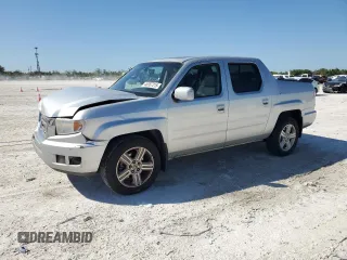 2009 Honda Ridgeline RTL with VIN 5FPYK16589B108605, listed as a Copart auction lot 48957215 with 207,143 mi miles and Salvage title. Bid and sale history available at DreamBid. Image 1.