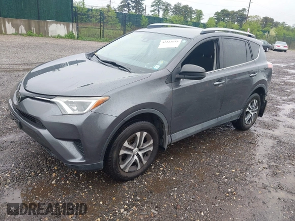 2017 Toyota RAV4 LE with VIN 2T3BFREV5HW603663, listed as a IAAI auction lot 42221653 with 102,734 mi miles and . Bid and sale history available at DreamBid. Image 2.