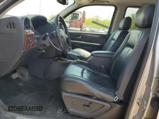 2006 GMC Envoy SLE z VIN 1GKDT13S662171123, wystawiony jako Copart lot #56418255 z przebiegiem 106 777 mil mil oraz Szkoda całkowita • Salvage title. Historia ofert i sprzedaży dostępna na DreamBid. Obrazek 7.