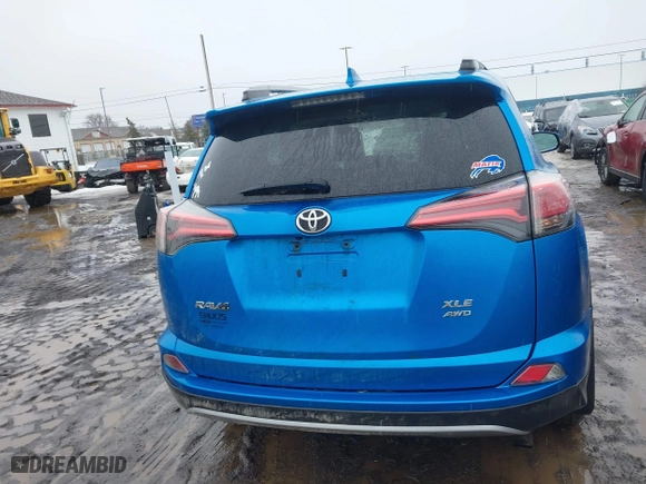 2017 Toyota RAV4 XLE with VIN 2T3RFREV2HW693031, listed as a IAAI auction lot 41671812 with 82,190 mi miles. Bid and sale history available at carsss.com. Image 16.