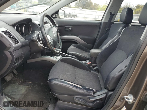 2011 Mitsubishi Outlander SE with VIN JA4AS3AW7BU027947, listed as a Copart auction lot 54623345 with 164,641 mi miles and Salvage title. Bid and sale history available at DreamBid. Image 7.