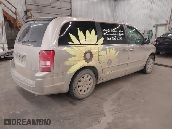 2009 Chrysler Town & Country LX with VIN 2A8HR44E79R683493, listed as a IAAI auction lot 42056729 with 147,227 mi miles. Bid and sale history available at carsss.com. Image 4.