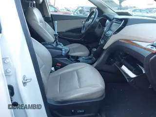 2014 Hyundai Santa Fe with VIN 5XYZUDLB4EG129473, listed as a IAAI auction lot 40978108 with 169,997 mi miles and . Bid and sale history available at DreamBid. Image 5.