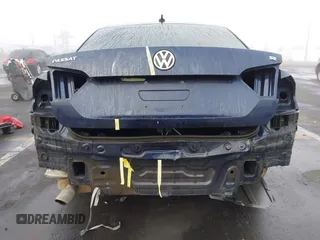 2012 Volkswagen Passat SE z VIN 1VWBP7A35CC106014, wystawiony jako IAAI lot #41150524 z przebiegiem 117 309 mil mil oraz . Historia ofert i sprzedaży dostępna na DreamBid. Obrazek 6.