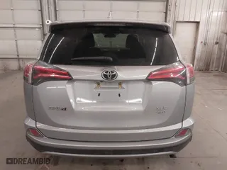 2018 Toyota RAV4 XLE with VIN 2T3RFREV4JW809416, listed as a IAAI auction lot 41263522 with 54,615 mi miles. Bid and sale history available at carsss.com. Image 17.