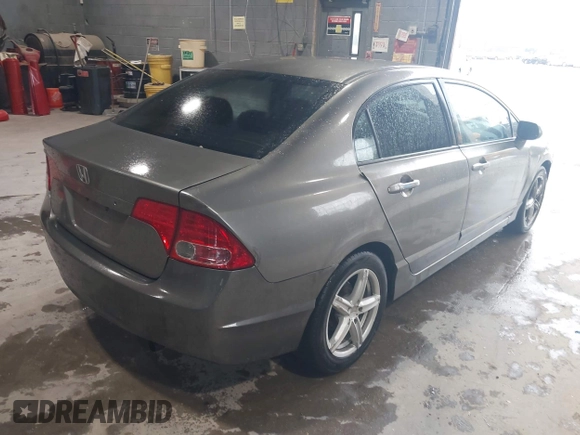 2006 Honda Civic LX z VIN 2HGFA16516H518446, wystawiony jako IAAI lot #42323833 z przebiegiem 222 934 mil mil oraz . Historia ofert i sprzedaży dostępna na DreamBid. Obrazek 4.
