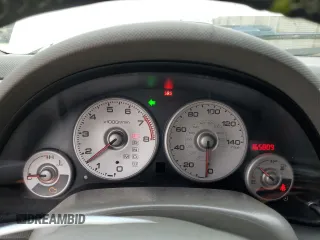 2002 Acura RSX Auto with VIN JH4DC548X2C034663, listed as a Copart auction lot 55980275 with 165,809 mi miles and Salvage title. Bid and sale history available at DreamBid. Image 9.