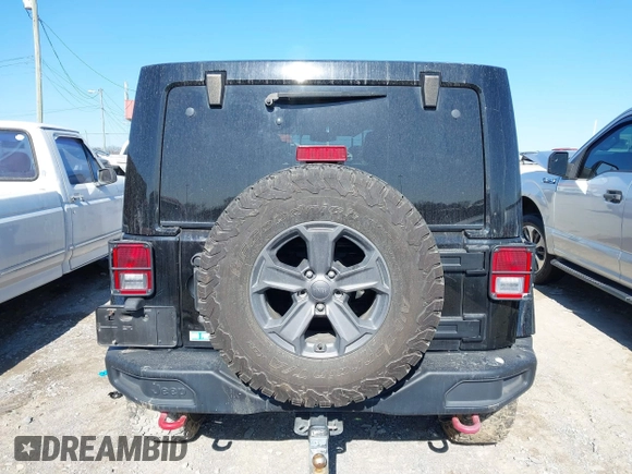 2017 Jeep Wrangler Unlimited Rubicon Recon с VIN 1C4HJWFG0HL737779, выставлен на аукционе IAAI как лот 41396395 с пробегом 125 845 миль миль и . История ставок и продаж доступна на DreamBid. Изображение 16.